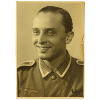 Studio portrait of German Unteroffizier in M 40 tunic with Czech anschluss medal. Espenlaub militaria